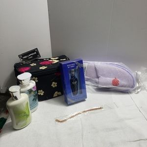 Bath&Body Works lotion, makeup travel bag ,slippers, dreams perfume ,bracelet